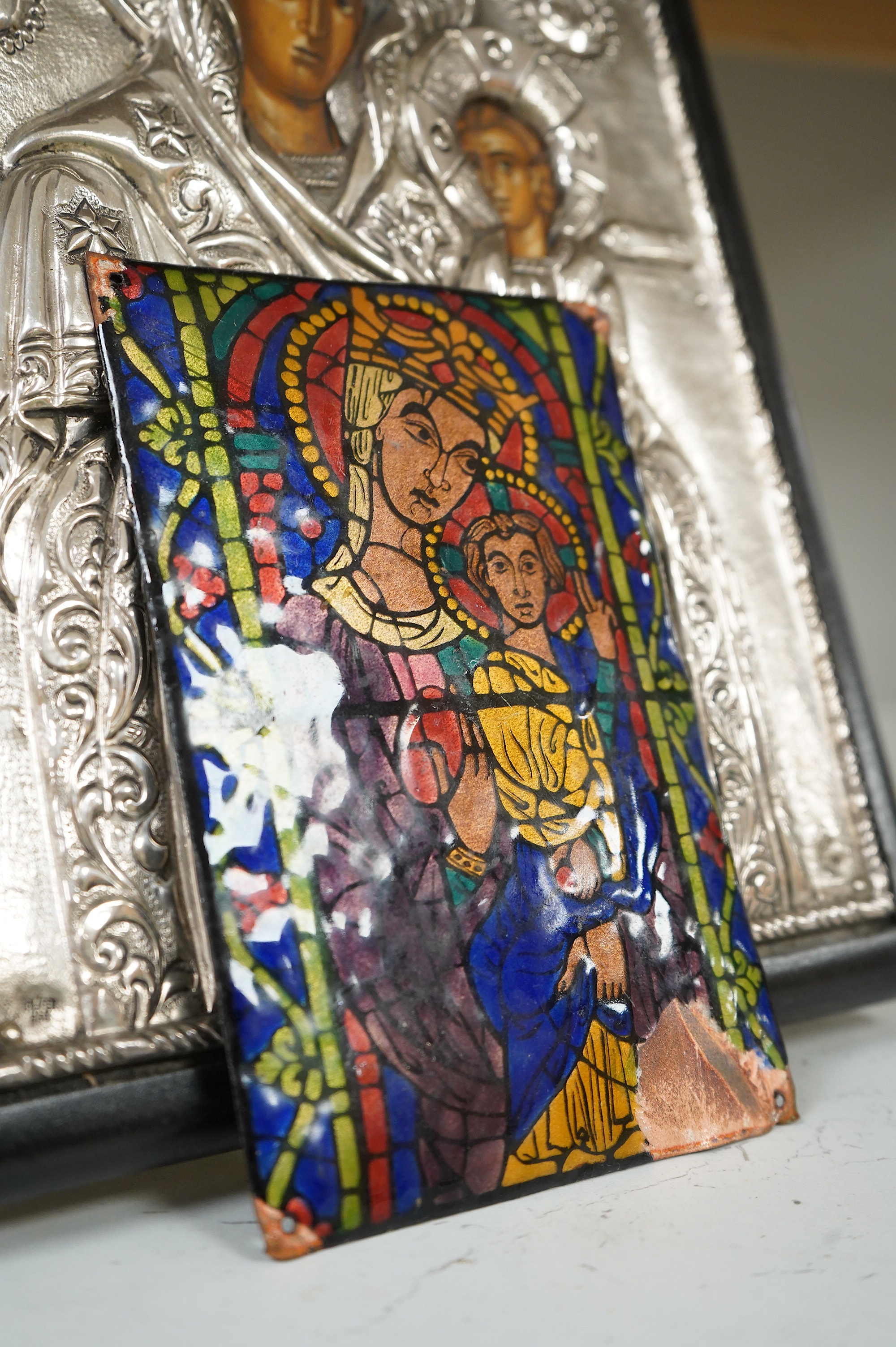 A Greek silver Icon Madonna and child, the oklad stamped silver 950, and a smaller similar enamel panel on copper, icon 31cm high
